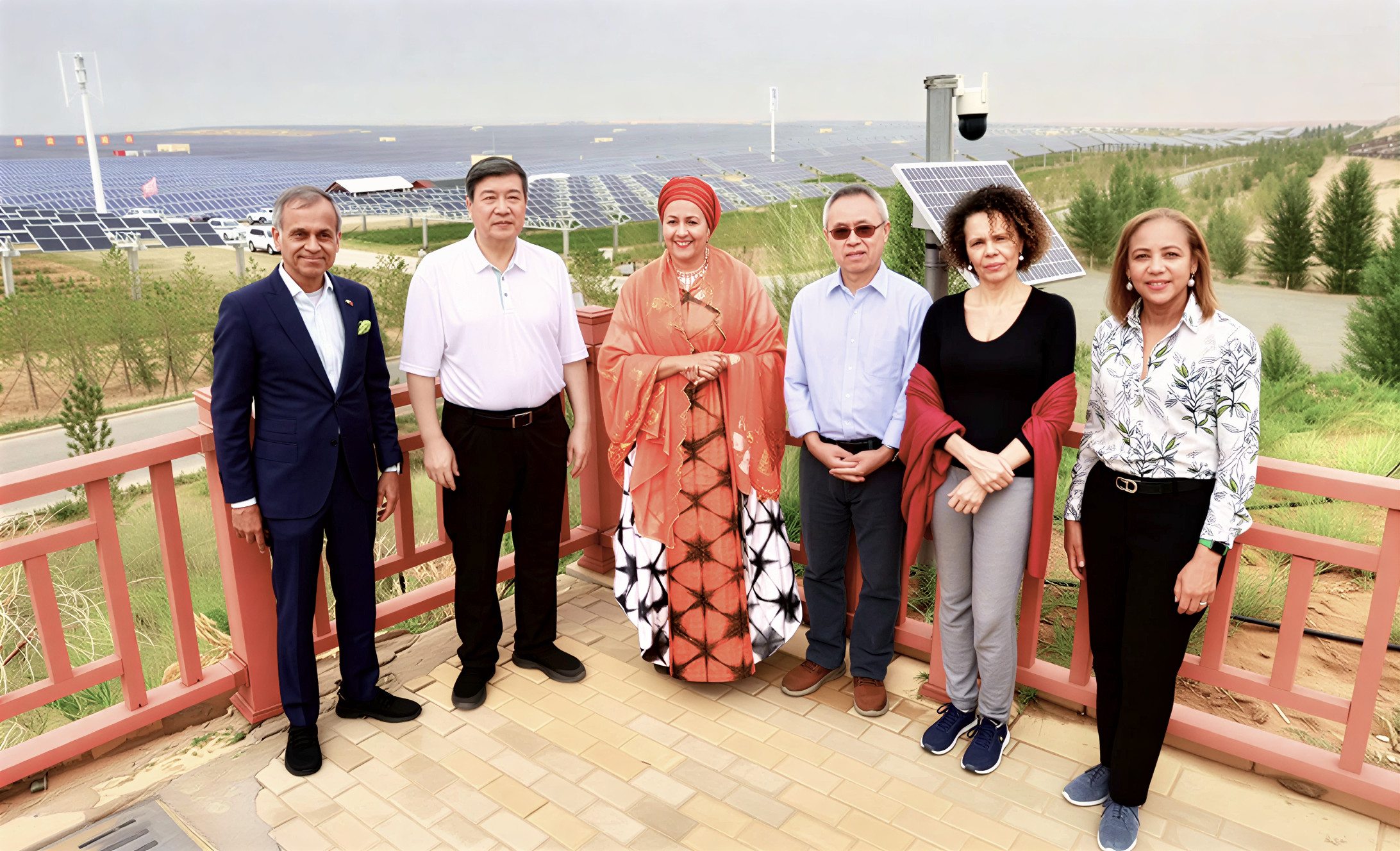 The UN Resident Coordinator in China with five other officials, including the Deputy Secretary-General.