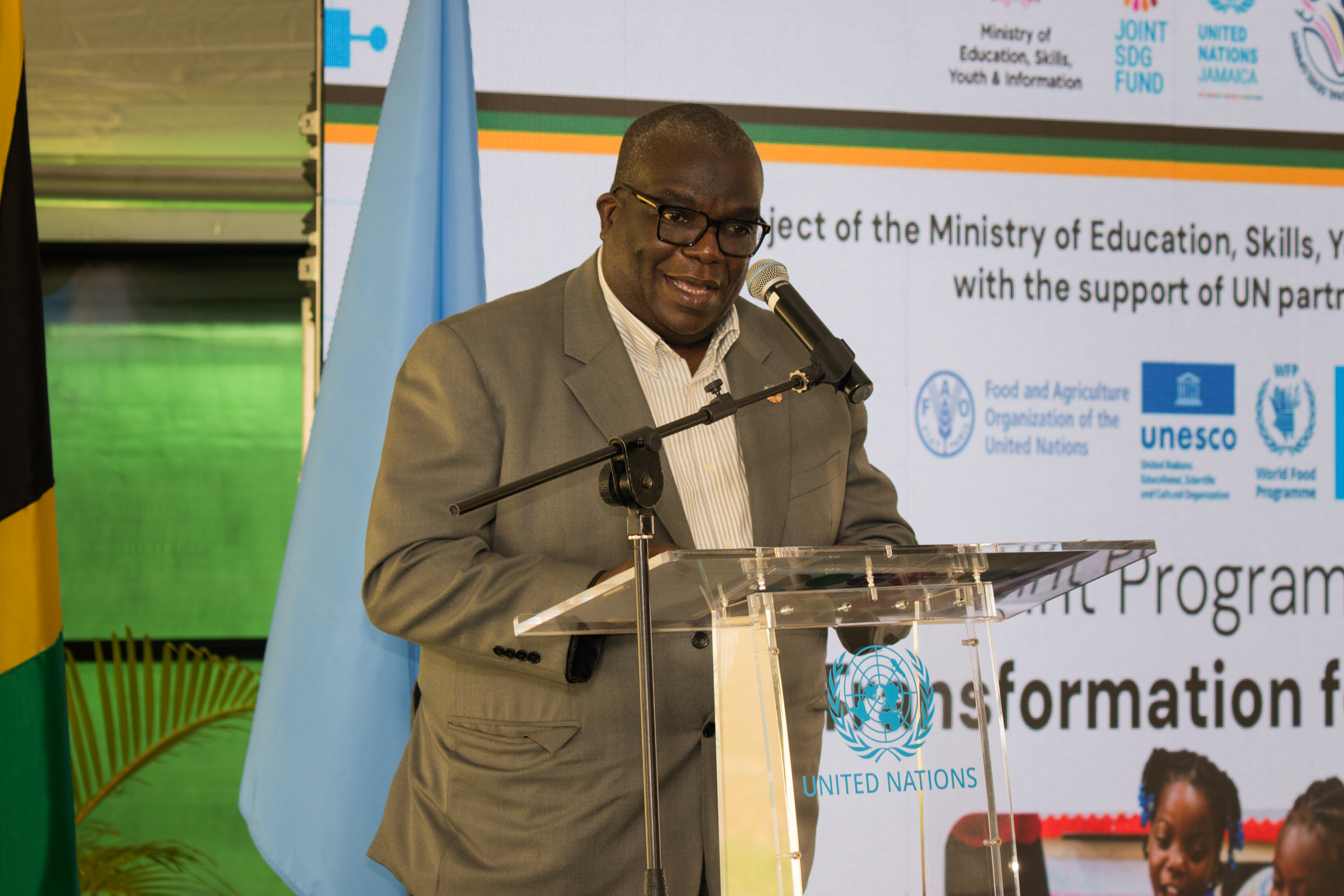 The UN Resident Coordinator in Jamaica delivers a speech.