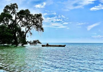 A beautiful seascape with a boat in view 