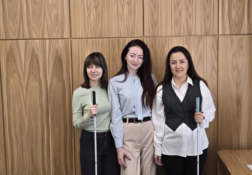 Three disability inclusion volunteers in Uzbekistan.