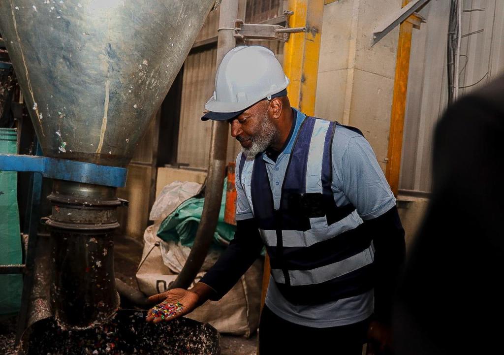 The Resident Coordinator in South Africa in a factory.