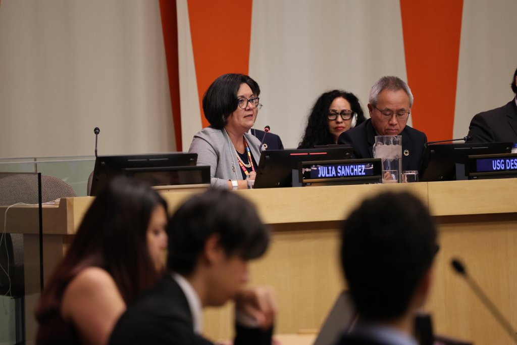 The UN Resident Coordinator in the Dominican Republic delivers a speech.