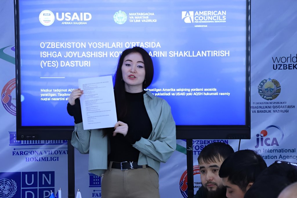 A UN disability inclusion volunteer delivers a training.