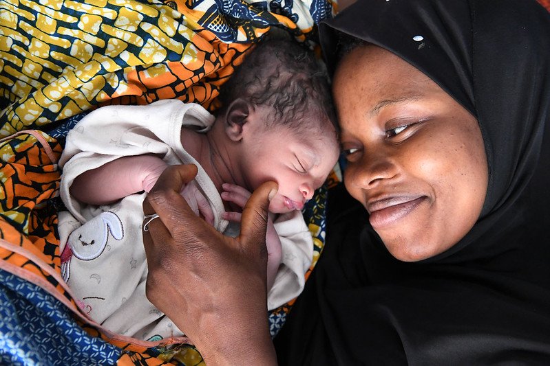 A woman and her baby in Cote d'Ivoire.
