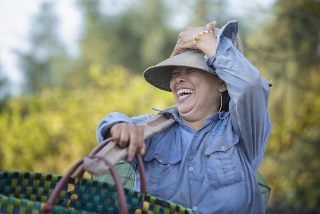 A woman smiles in Viet Nam.