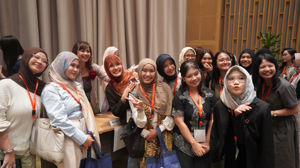 Young women leaders in Indonesia at an event.
