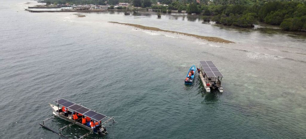 Solar panels being delivered to a coastal community in Indonesia.
