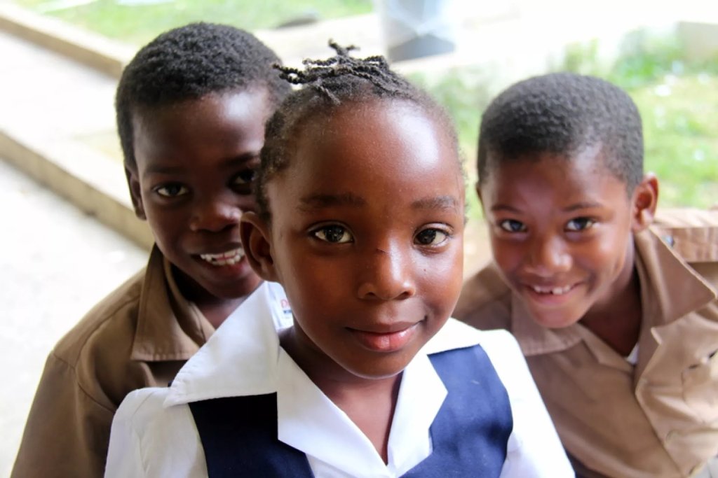 Three students in Jamaica.