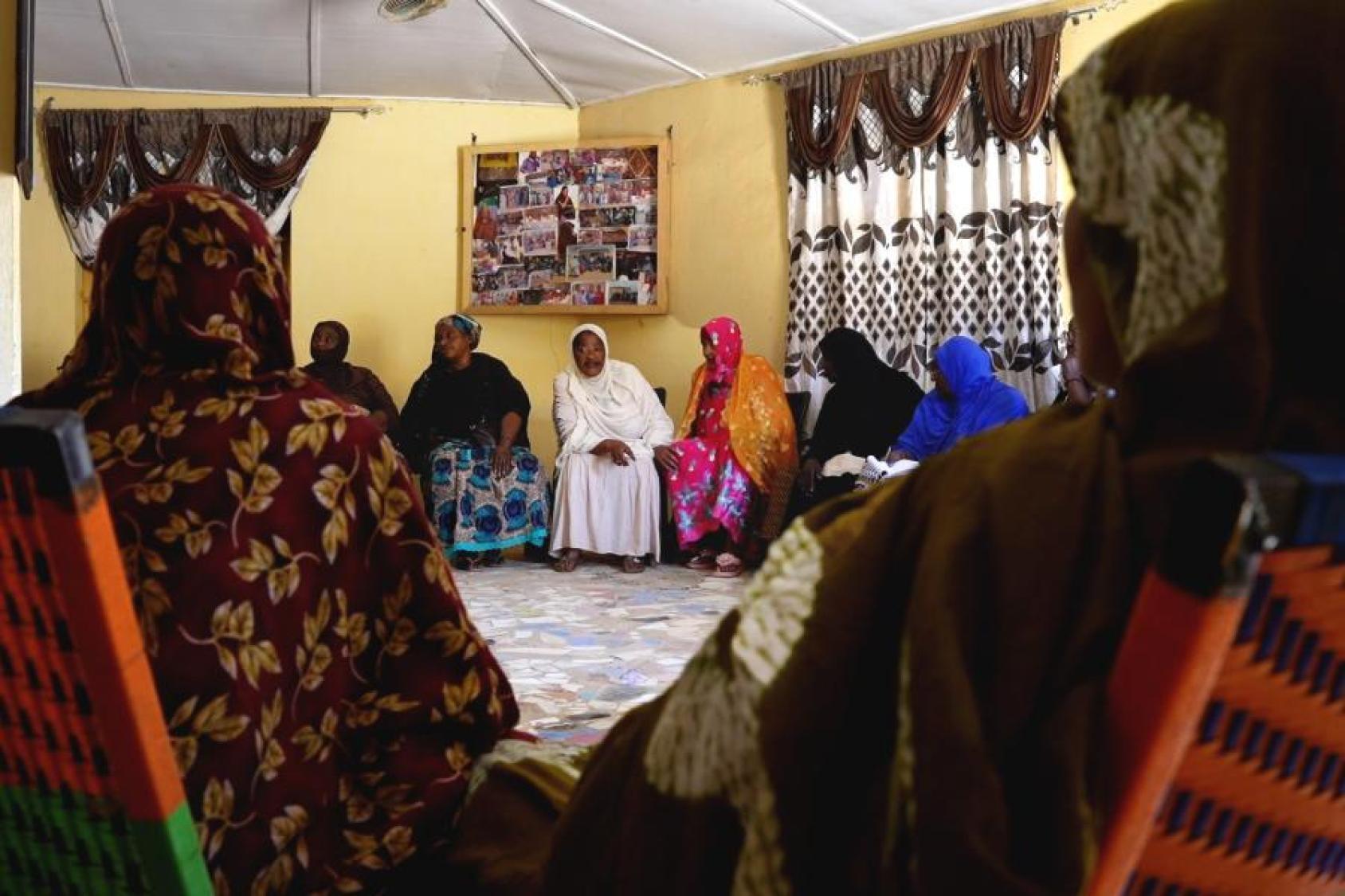 A group of women during an indoor meeting