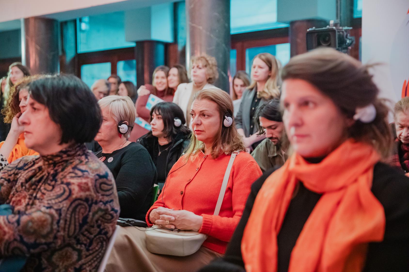 a group of poeple listening to a consultation on the national development strategy of North Macedonia