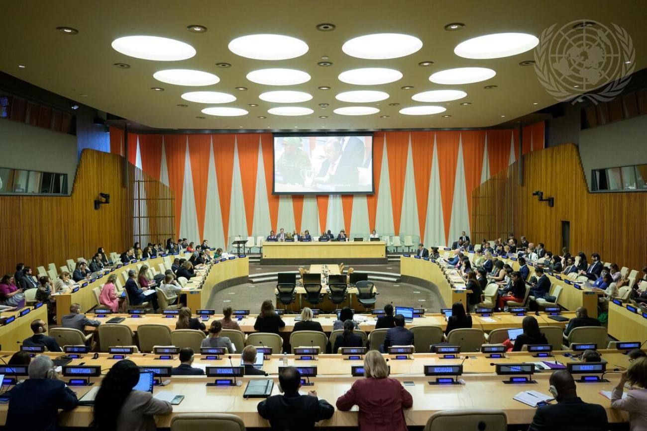wide angle shot of meeting room with orange background