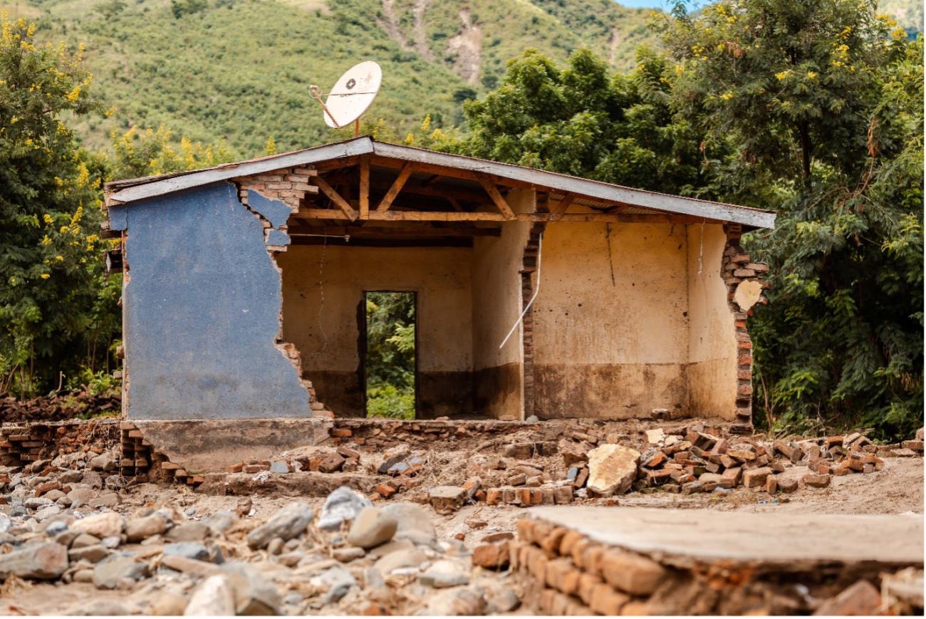 half destroyed house in the rainforest